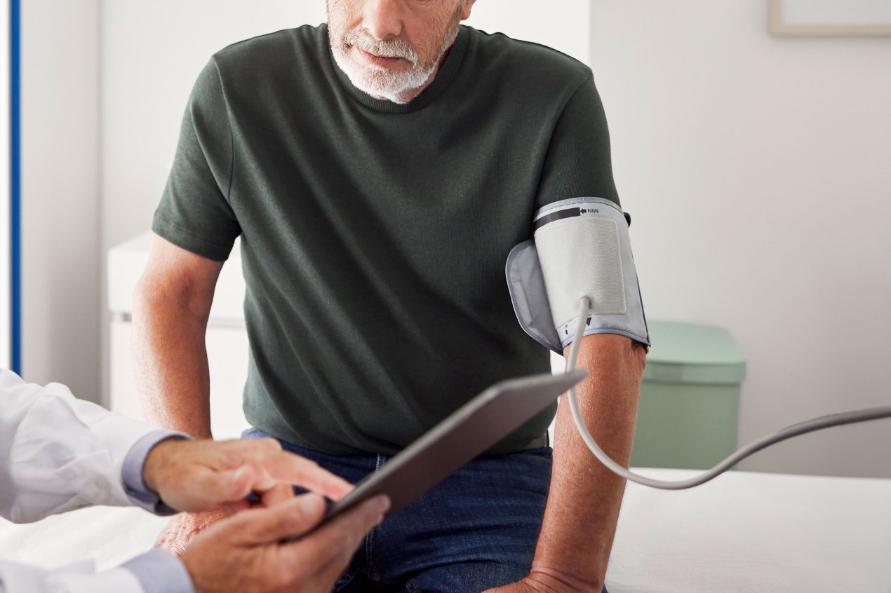 Man getting blood pressure checked